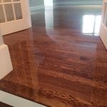 Refinishing a wood floor that has been worn or damaged to better than new condition